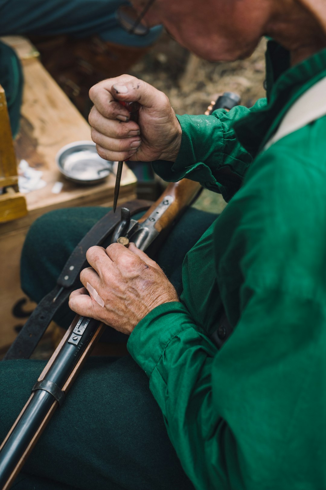 person holding black metal rod