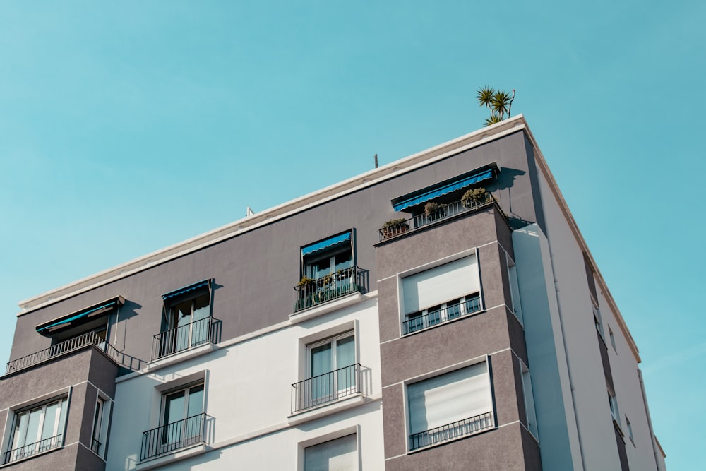 white concrete building under blue sky during daytime