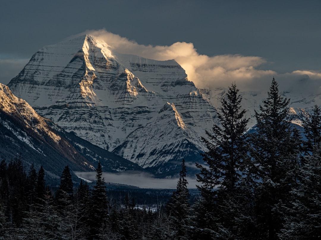 snow covered mountain during daytime