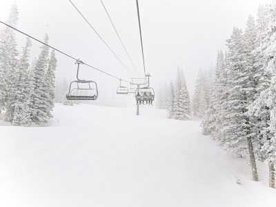 Chairlift over snowy mountain