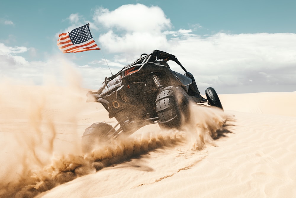 black and red car on desert