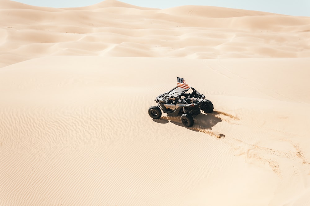 black and white car on desert