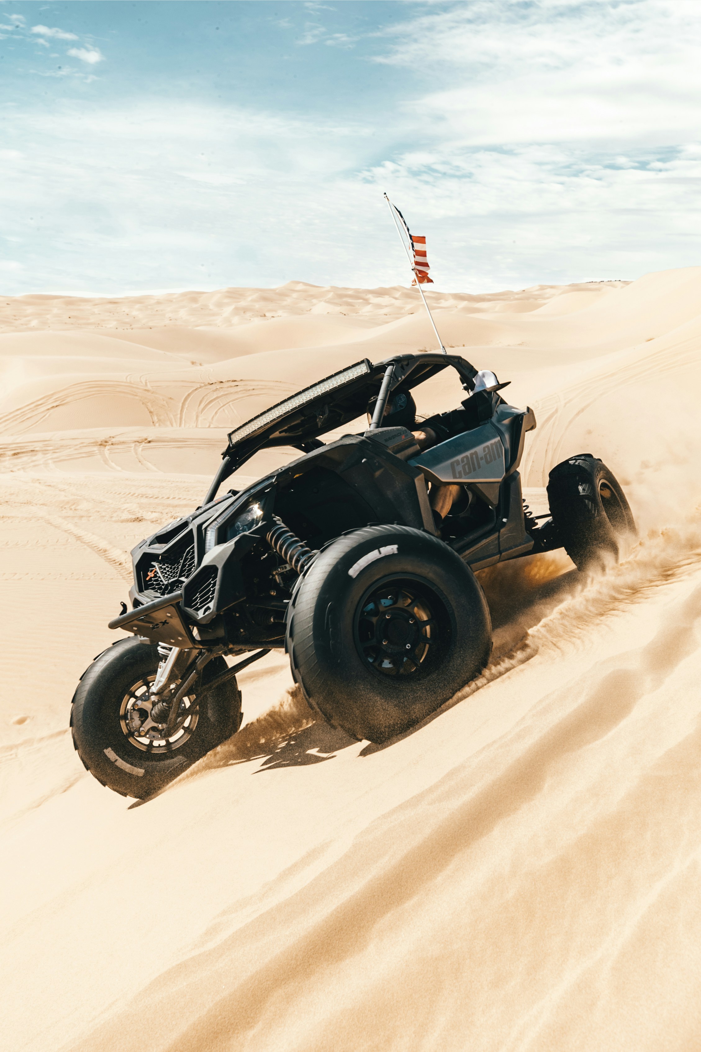 black and red f 1 on desert