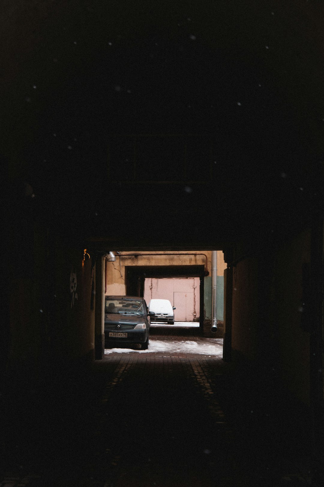 white car in a dark room