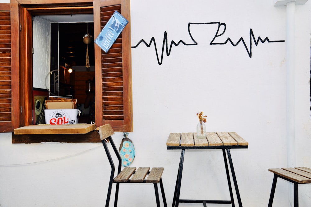 brown wooden table with chairs