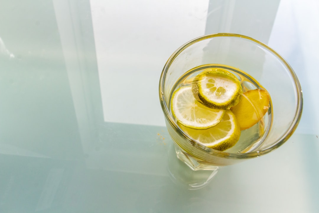 clear drinking glass with sliced lemon