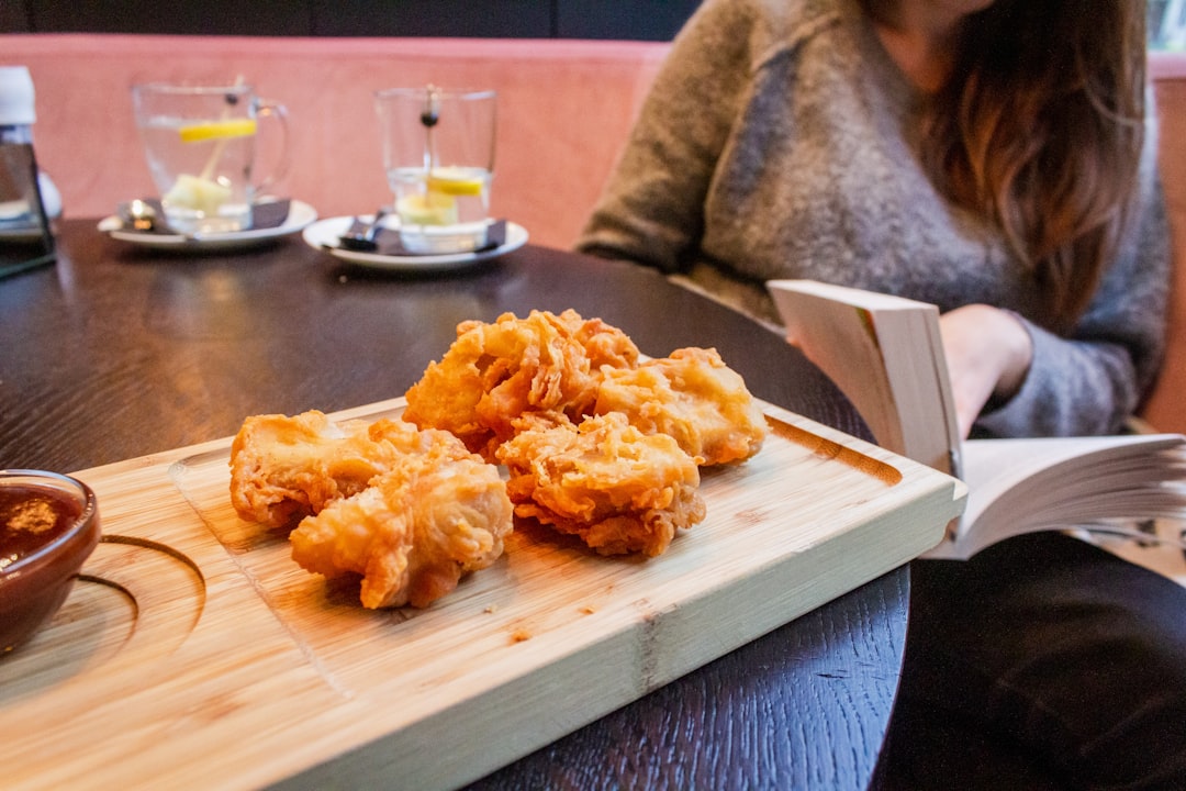 fried food on brown wooden tray