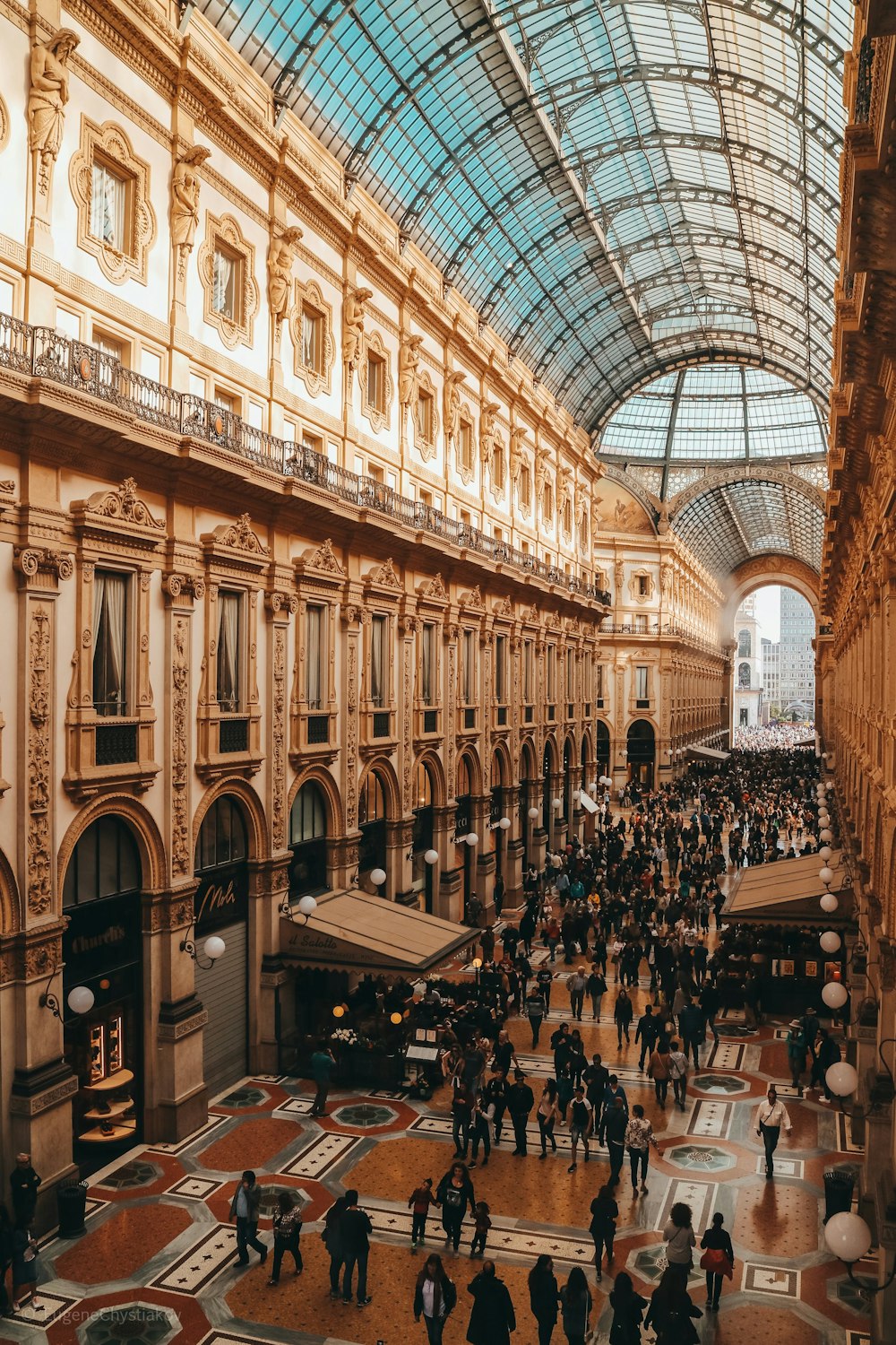 people sitting on chairs inside building