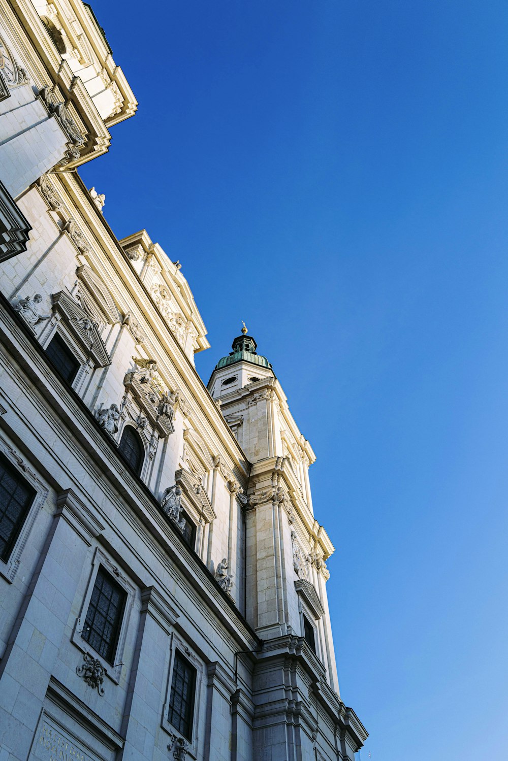 white concrete building under blue sky during daytime