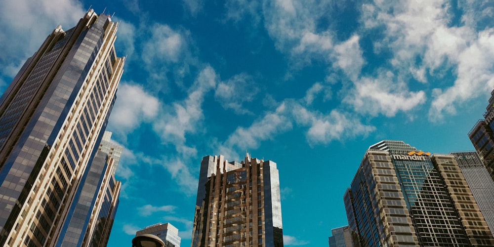 brown and white high rise building under blue sky during daytime