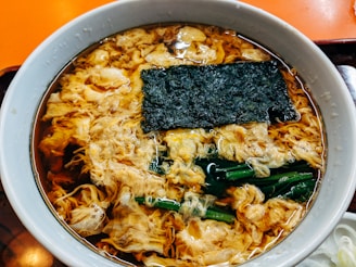 Korean Convenience Store Culture noodles with meat and vegetables in white ceramic bowl
