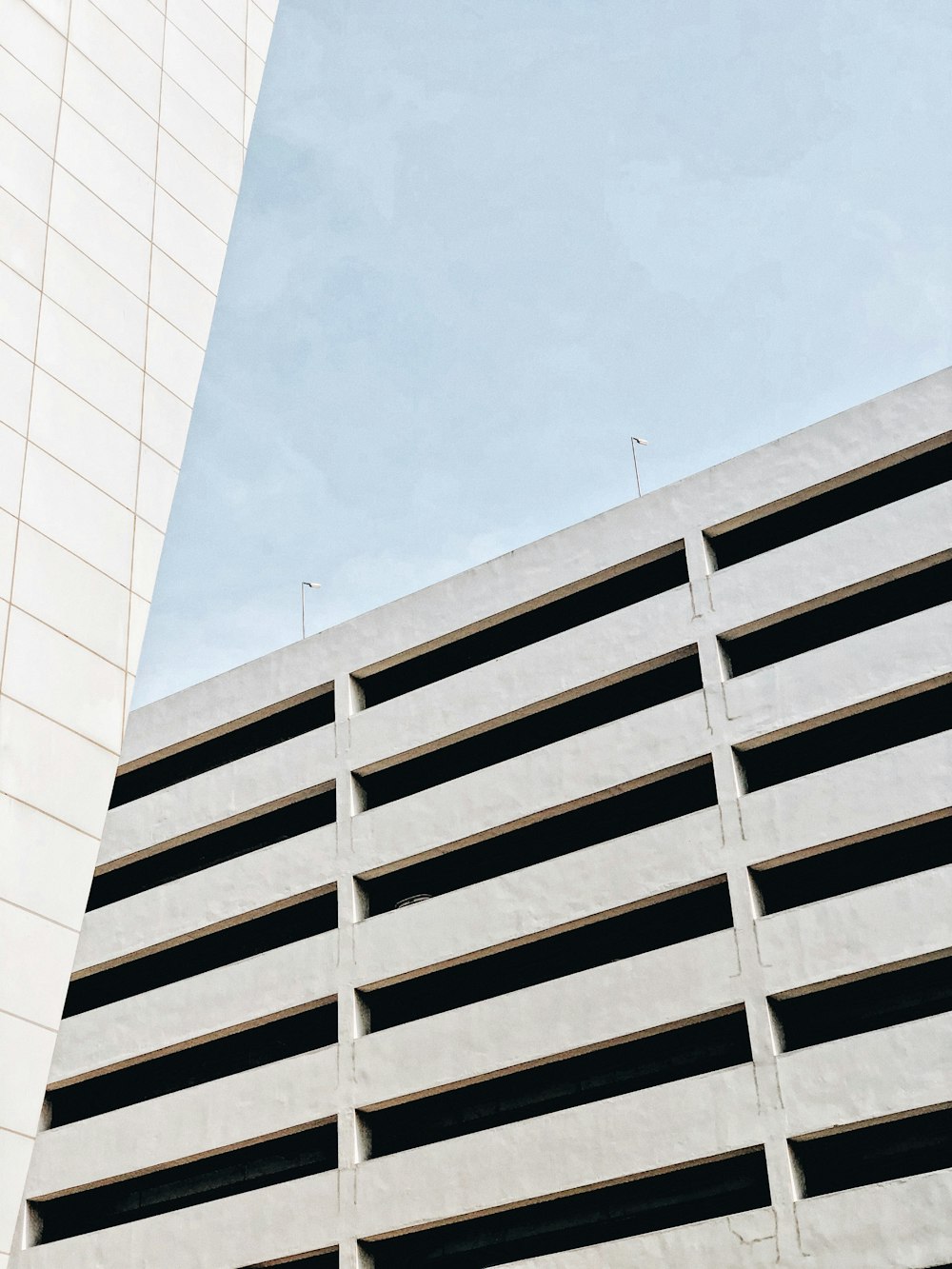 white concrete building under blue sky during daytime