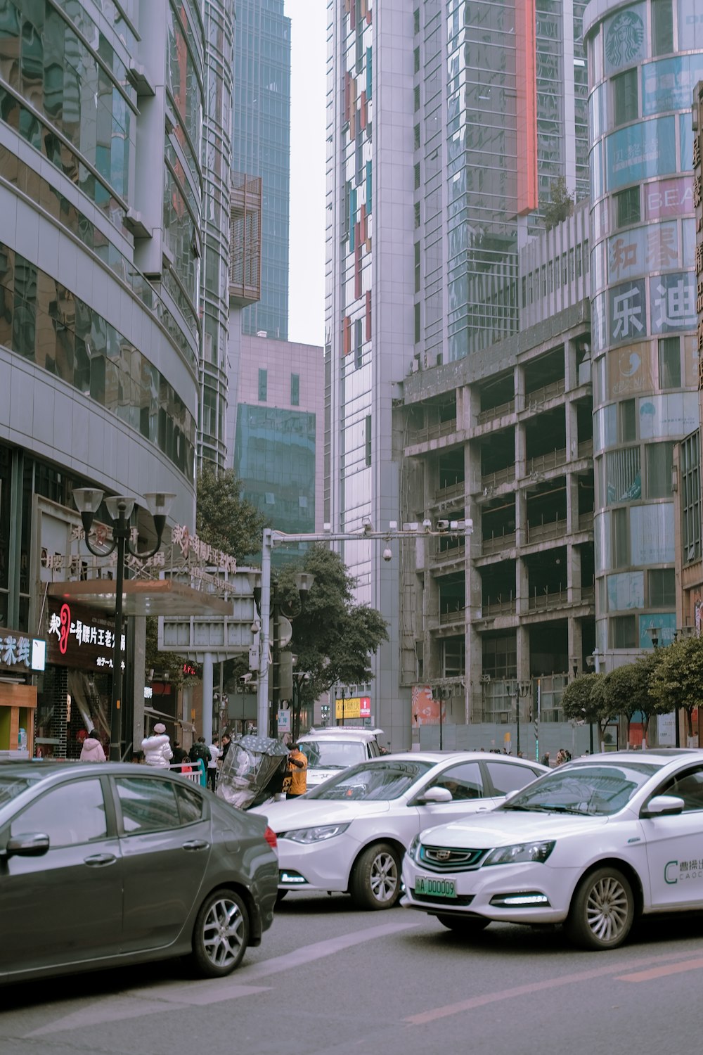 cars parked on side of the road in city