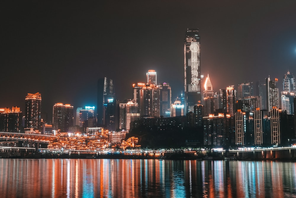 city skyline during night time