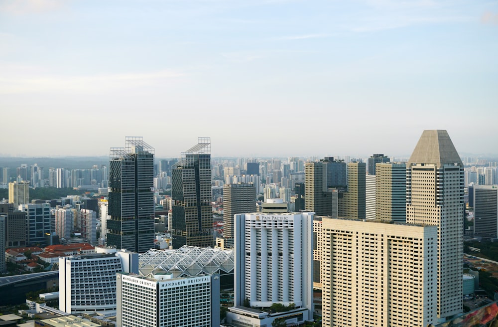 city buildings under white sky during daytime