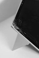 white smartphone on white table