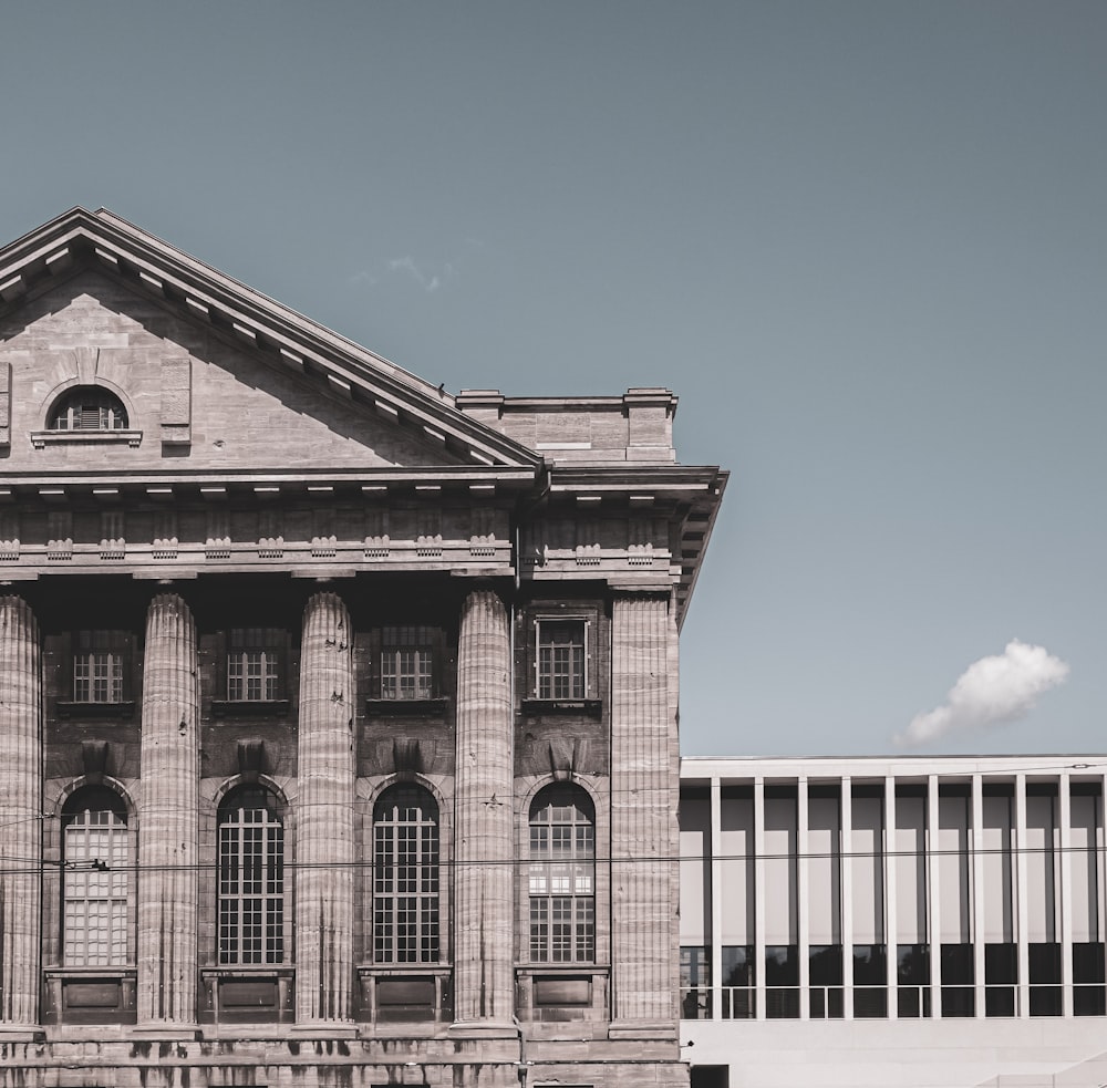 beige concrete building under blue sky during daytime