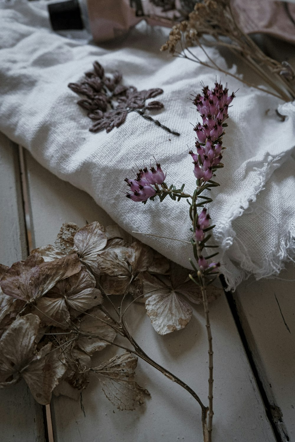 white purple and green floral textile