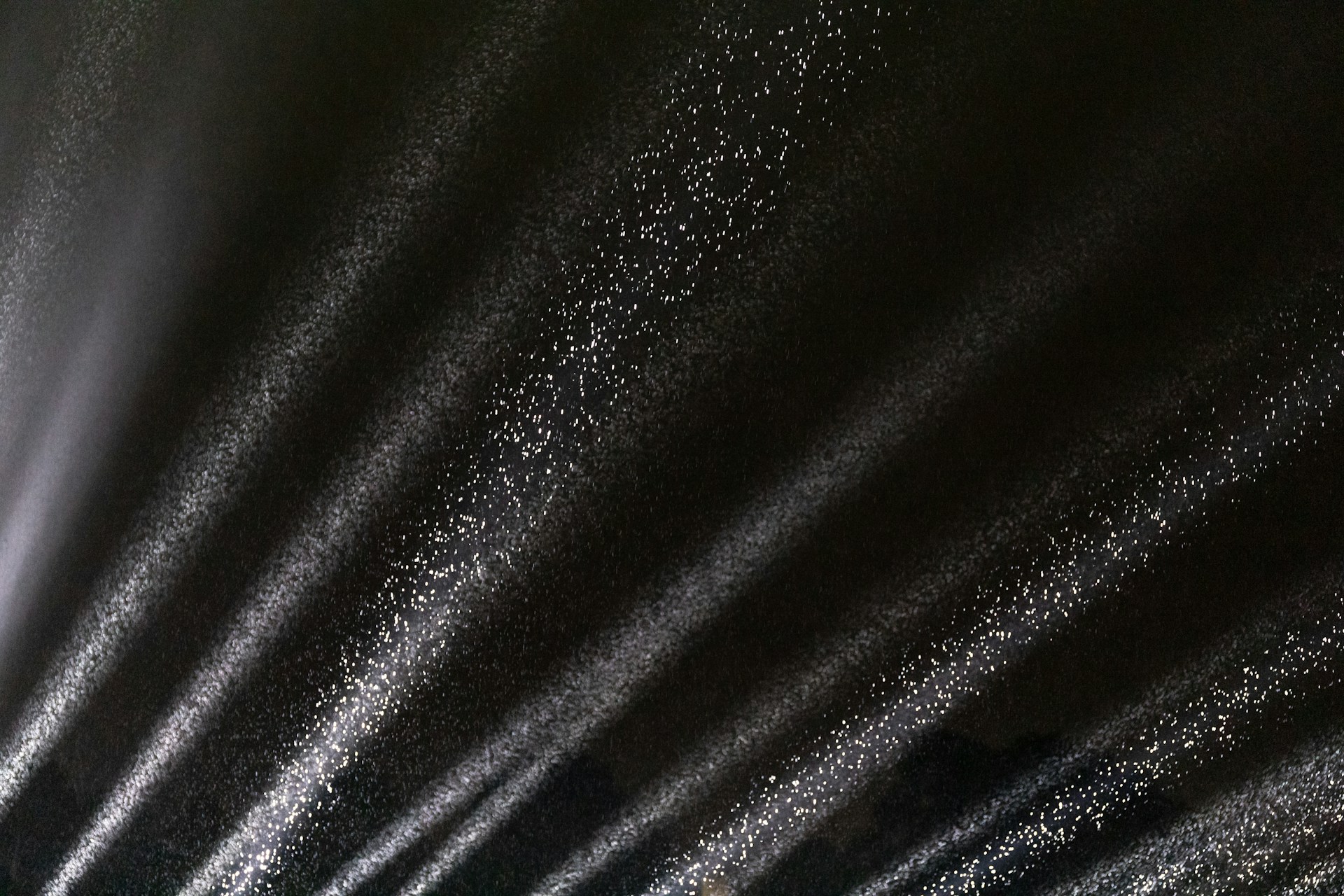black textile in close up photography