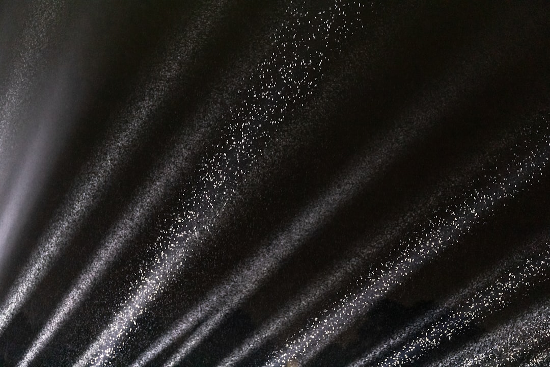 black textile in close up photography