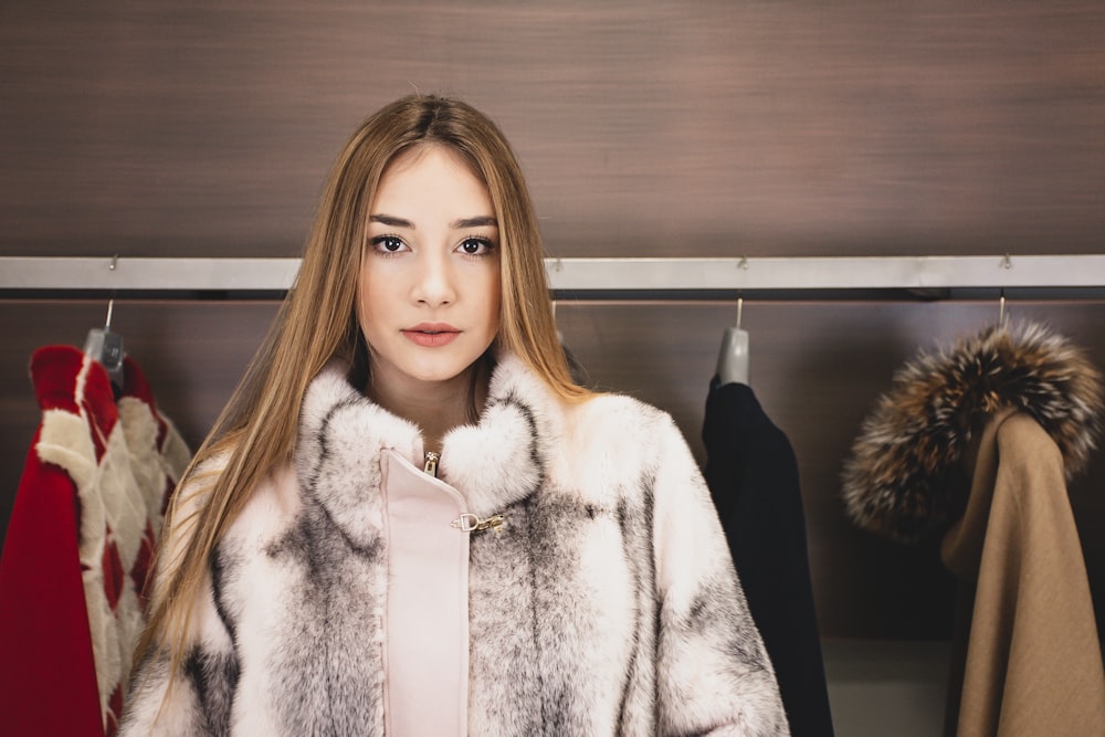 woman in white fur coat