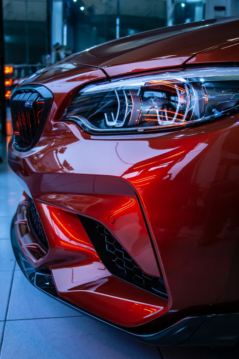 red car in a parking lot