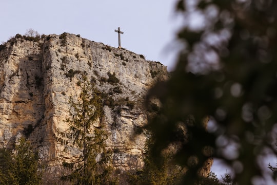 person standing on rock formation during daytime in Plan-de-Baix France