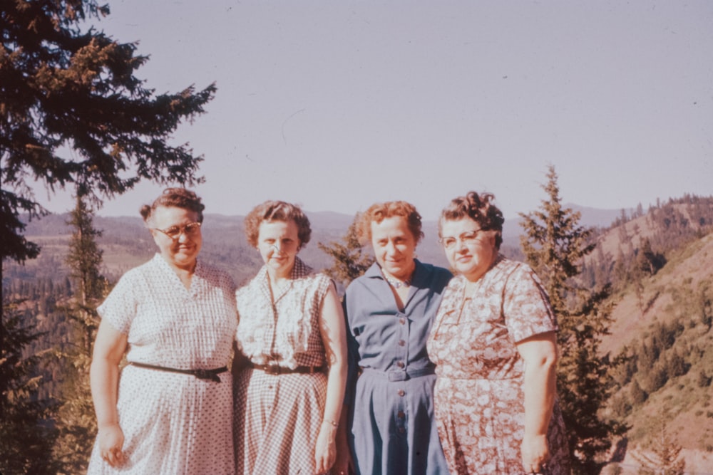 group of people standing on field