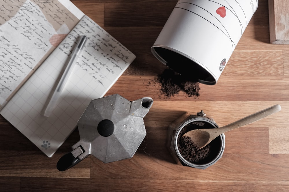 black ceramic mug on brown wooden table