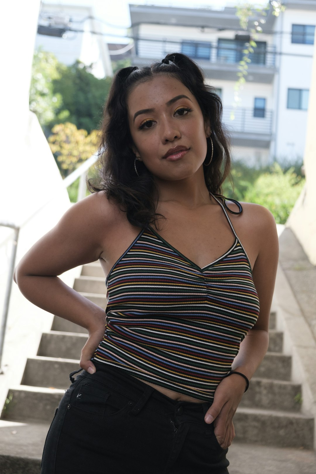 woman in black and white stripe tank top