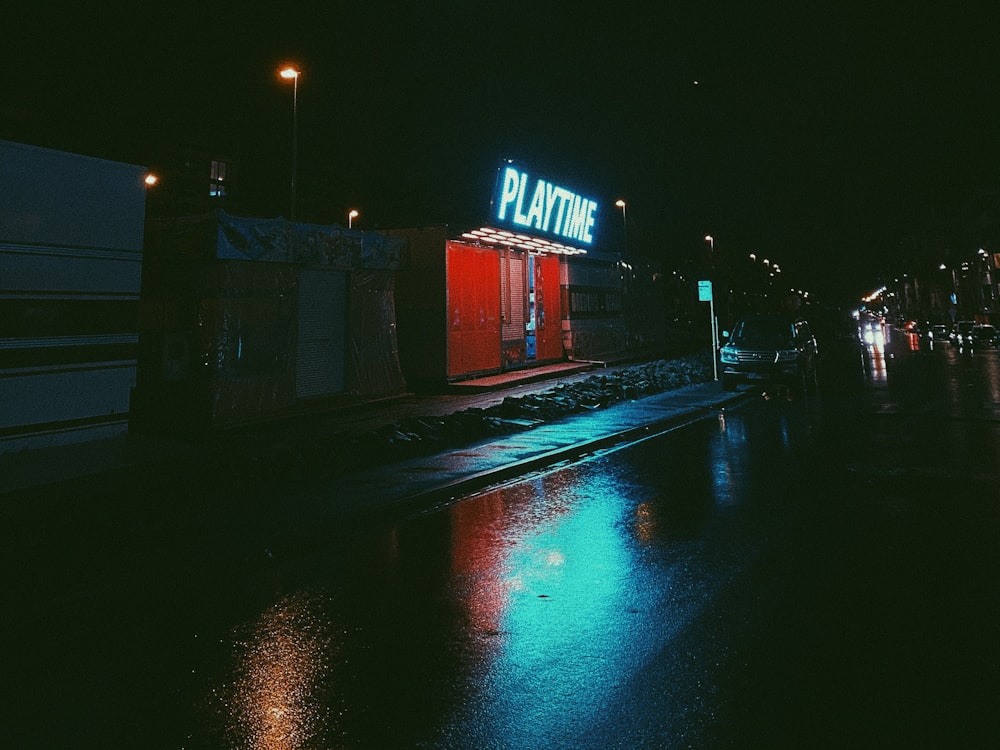 red and white building during night time