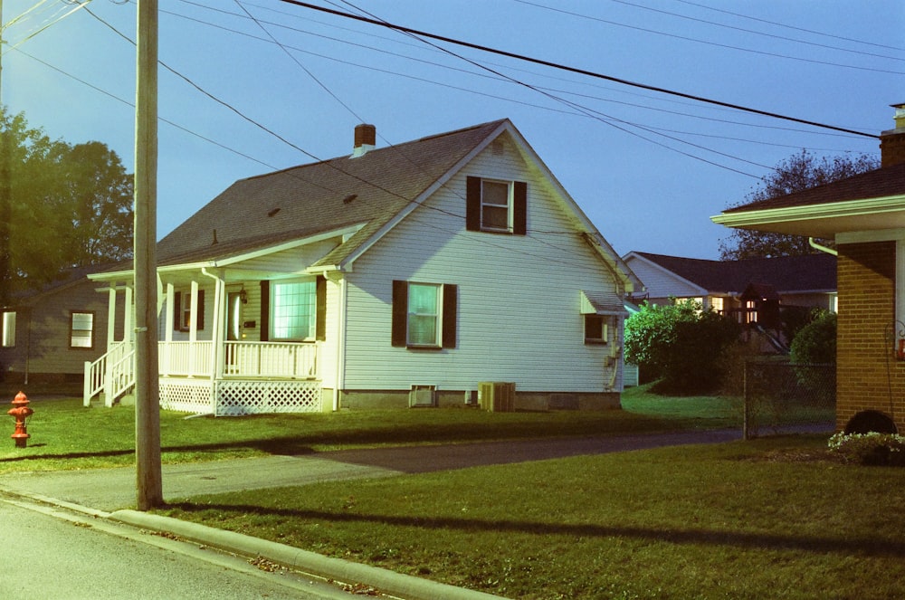 white and blue wooden house