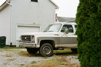 The Gunk & Junk Hauling truck parked in front of a residential home in Austin, Texas.