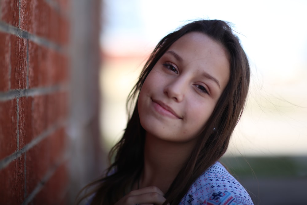 woman in blue and white shirt