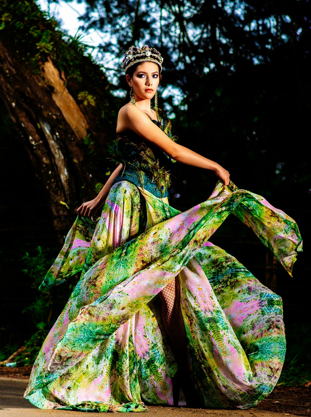 woman in green and purple floral dress