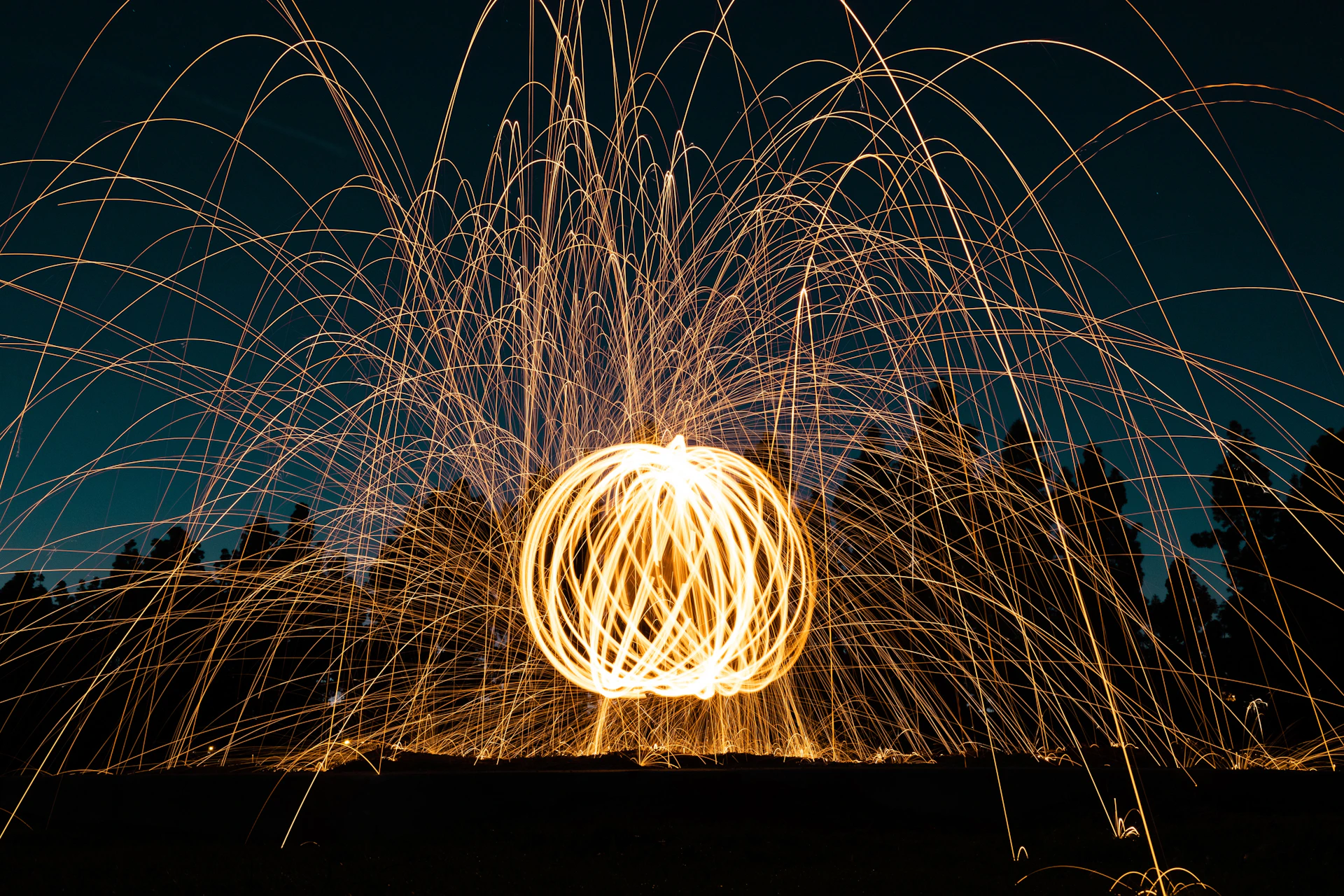A dynamic shot of light trails swirling in a dark space, evoking movement and energy central to the project's theme.