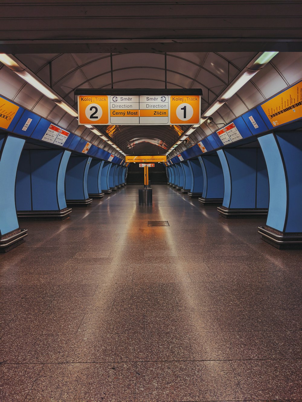 blue and yellow train station