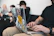 Close-up of a laptop covered in bold, colorful stickers from Boldflush, showcasing edgy designs.