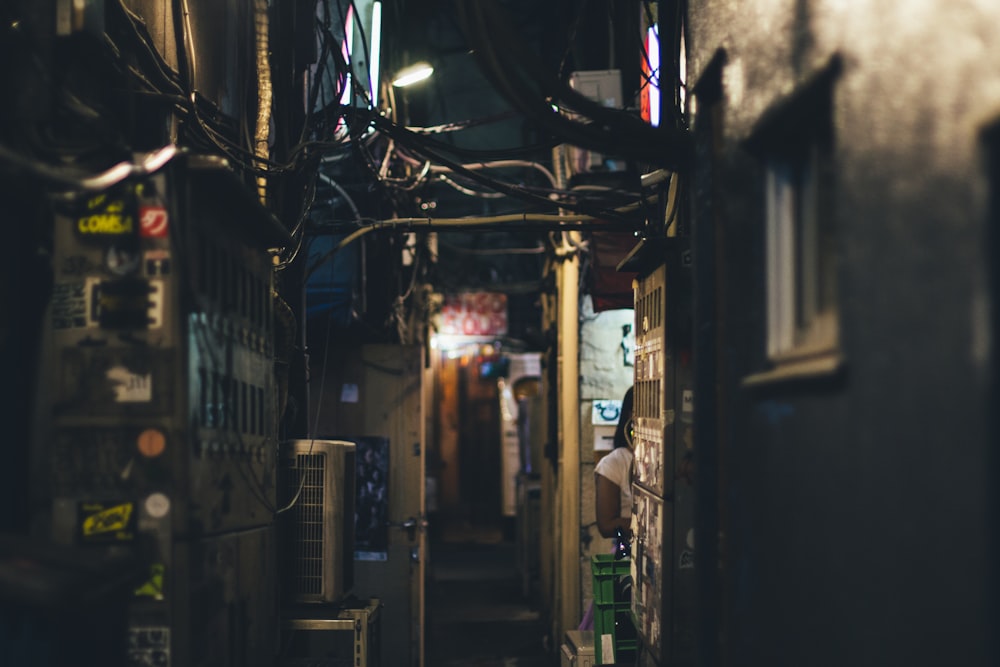 alley in between buildings during night time