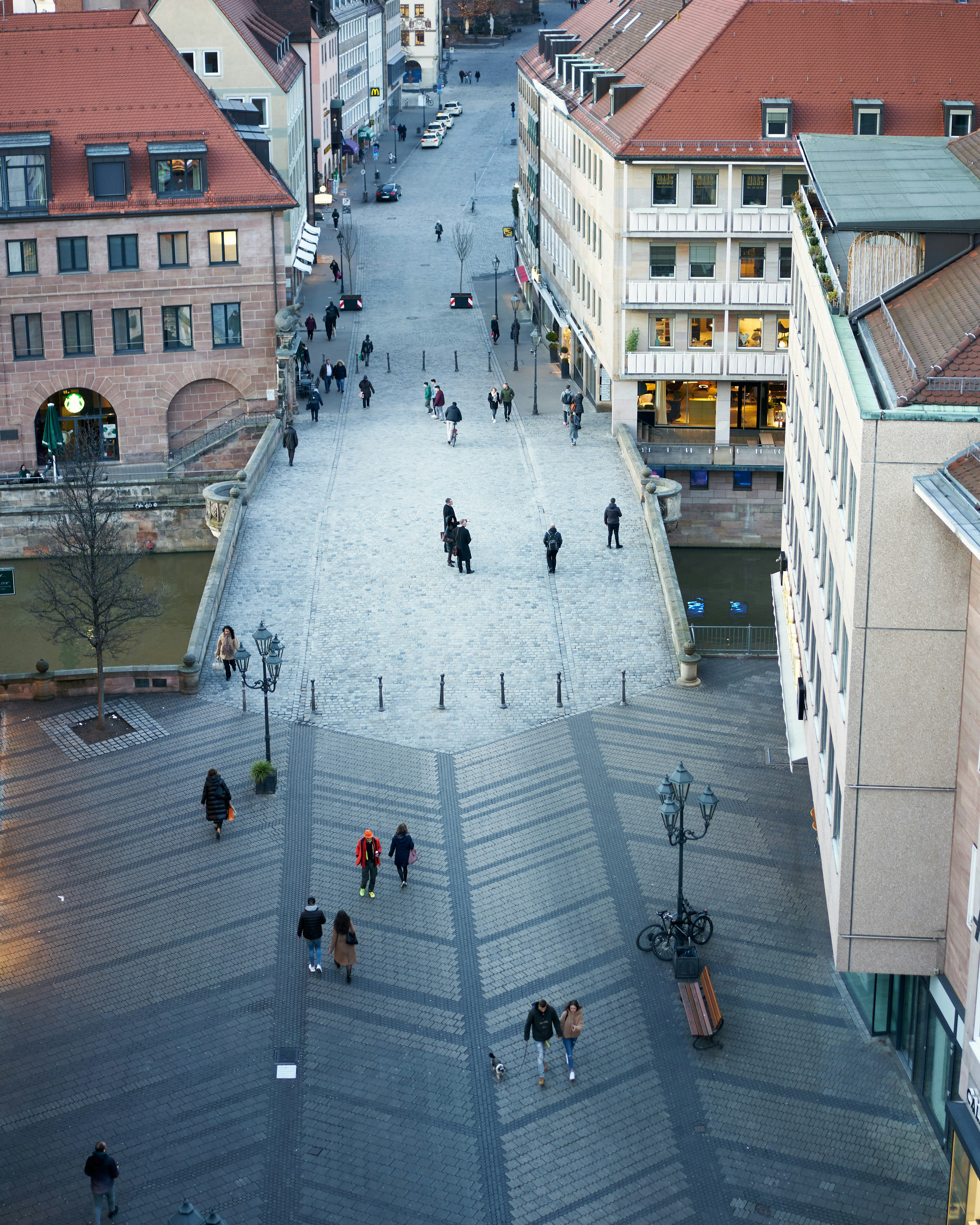 people walking on pedestrian lane during daytime