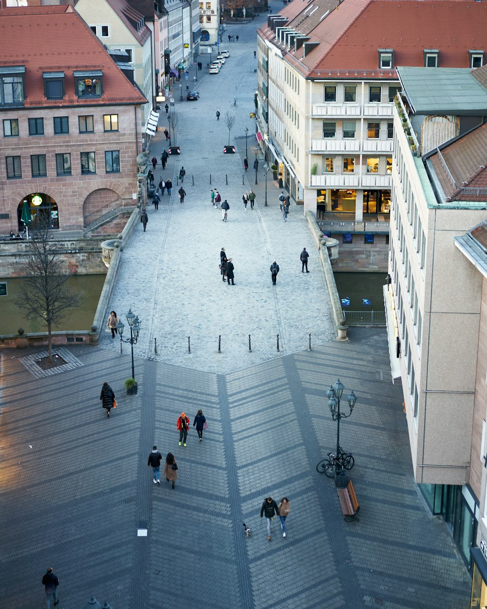 people walking on pedestrian lane during daytime