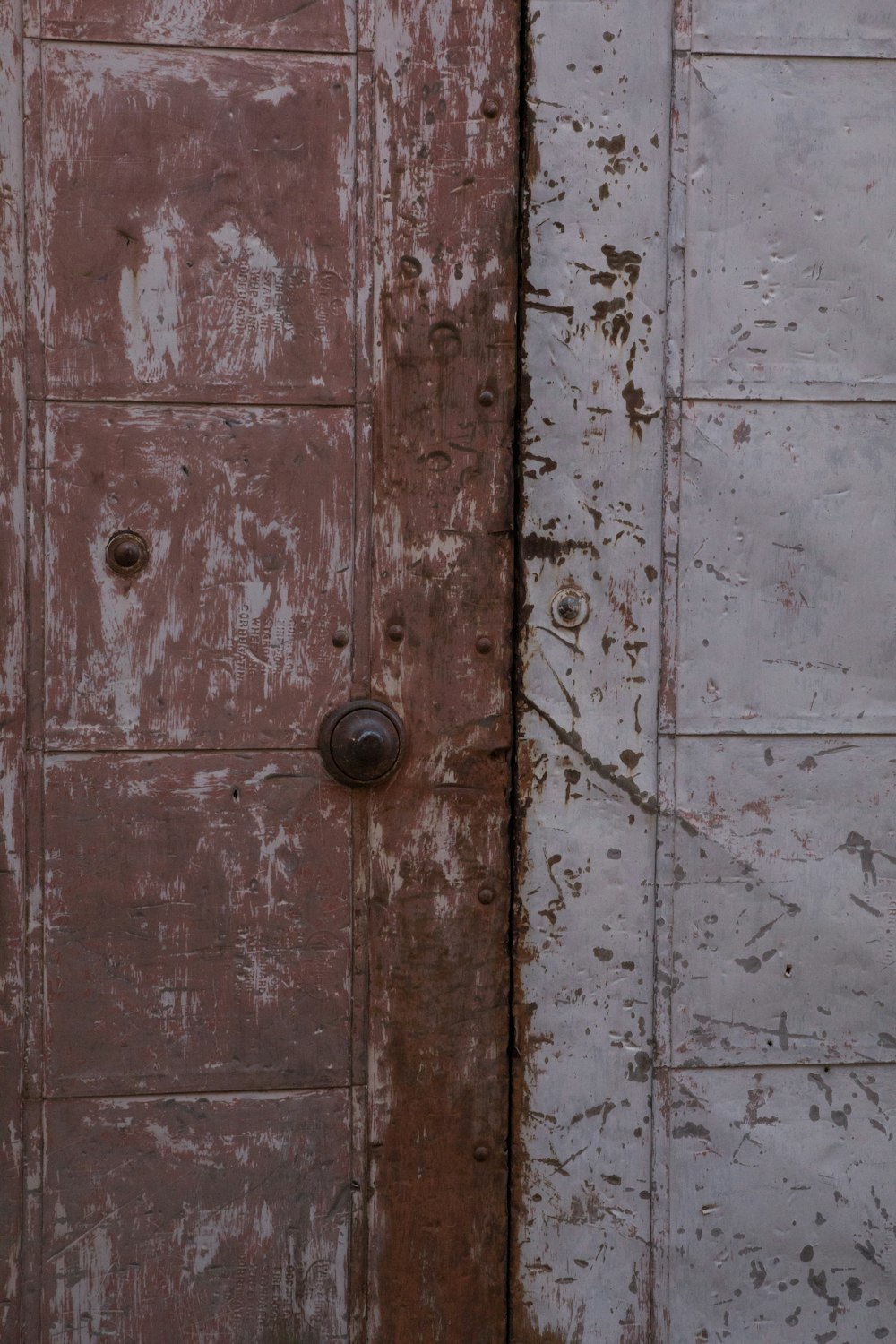 brown wooden door with brass door knob