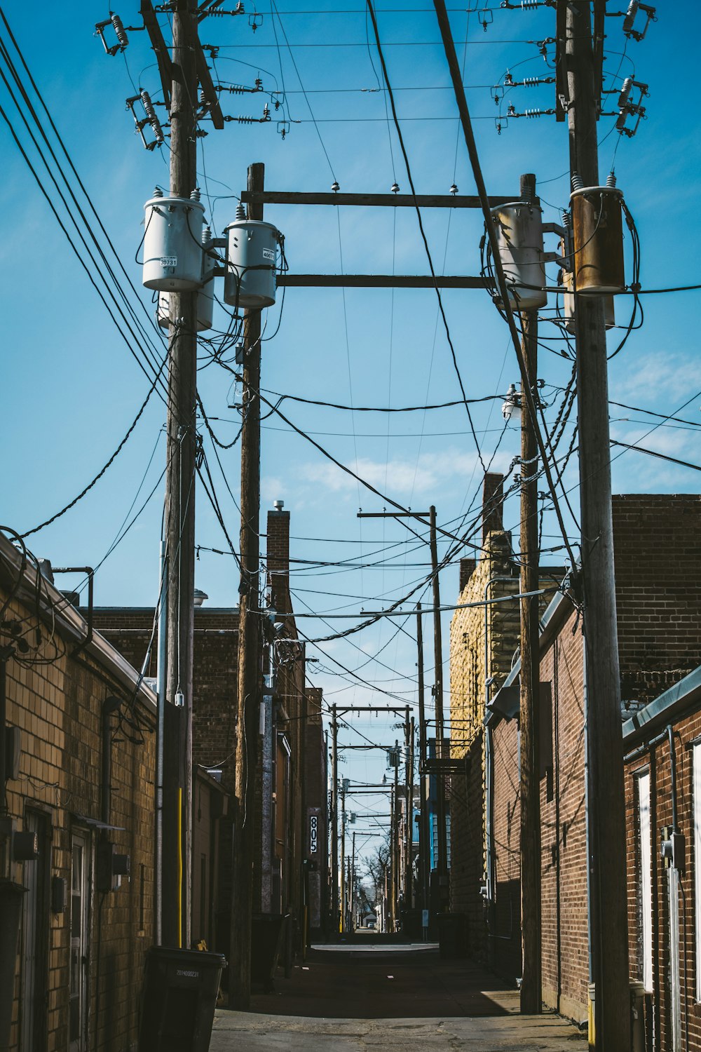 brown brick building under blue sky during daytime