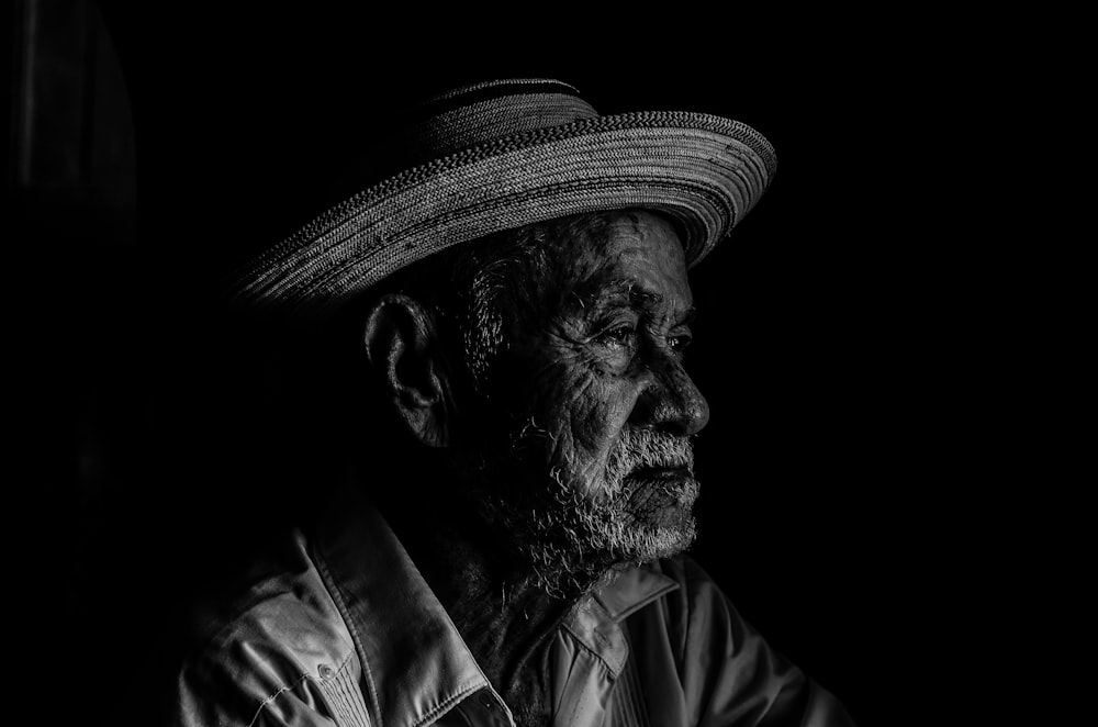 man in black and white hat