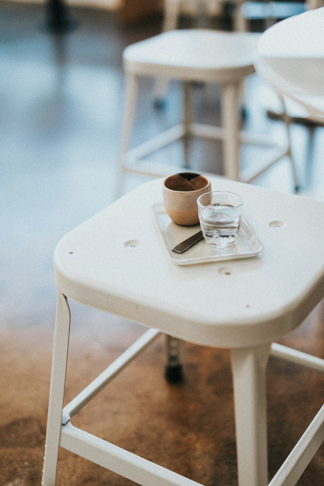 clear drinking glass on white table