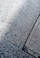 Close-up of smooth asphalt surface with clean edges.