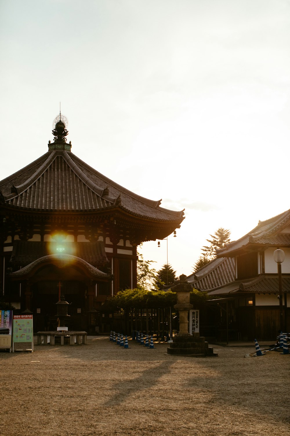 people walking on street near brown wooden building during daytime