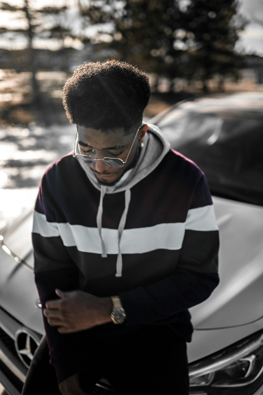 man in blue and white zip up jacket