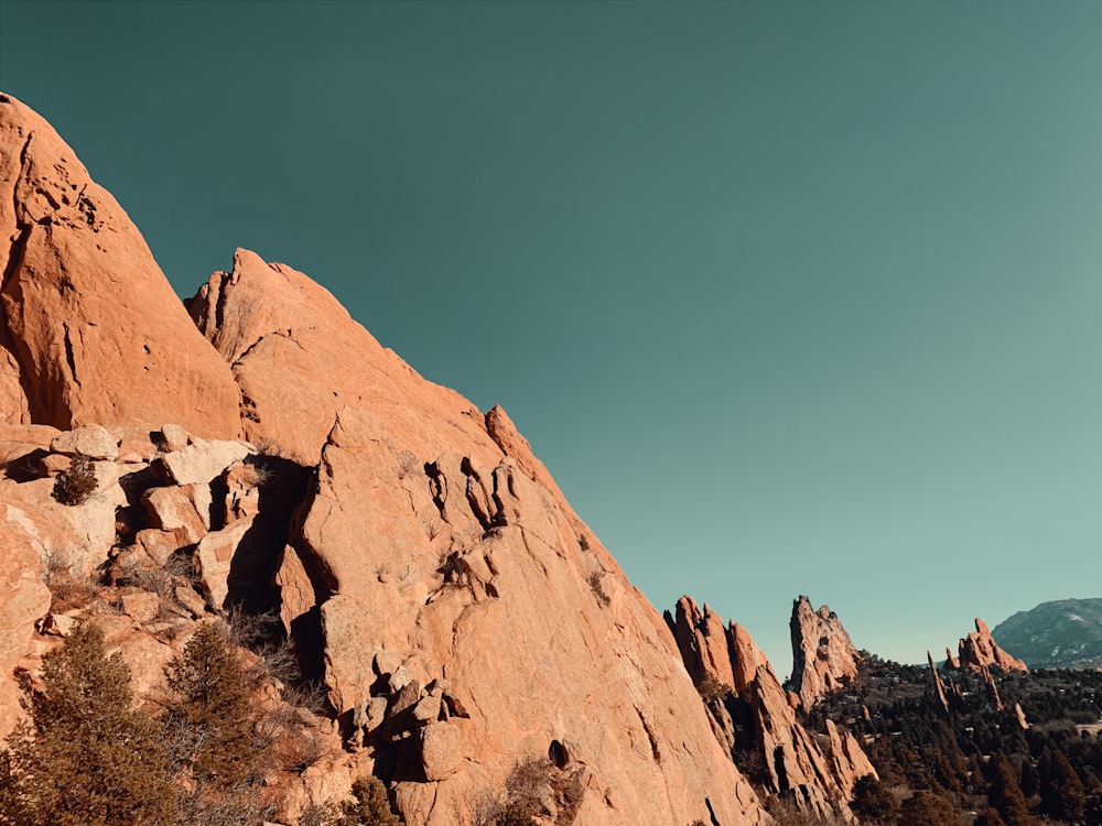 brown rock formation under blue sky during daytime