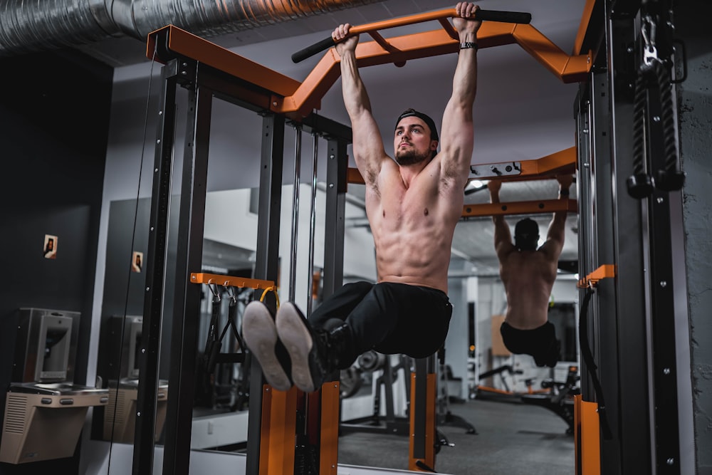 man in black shorts doing exercise